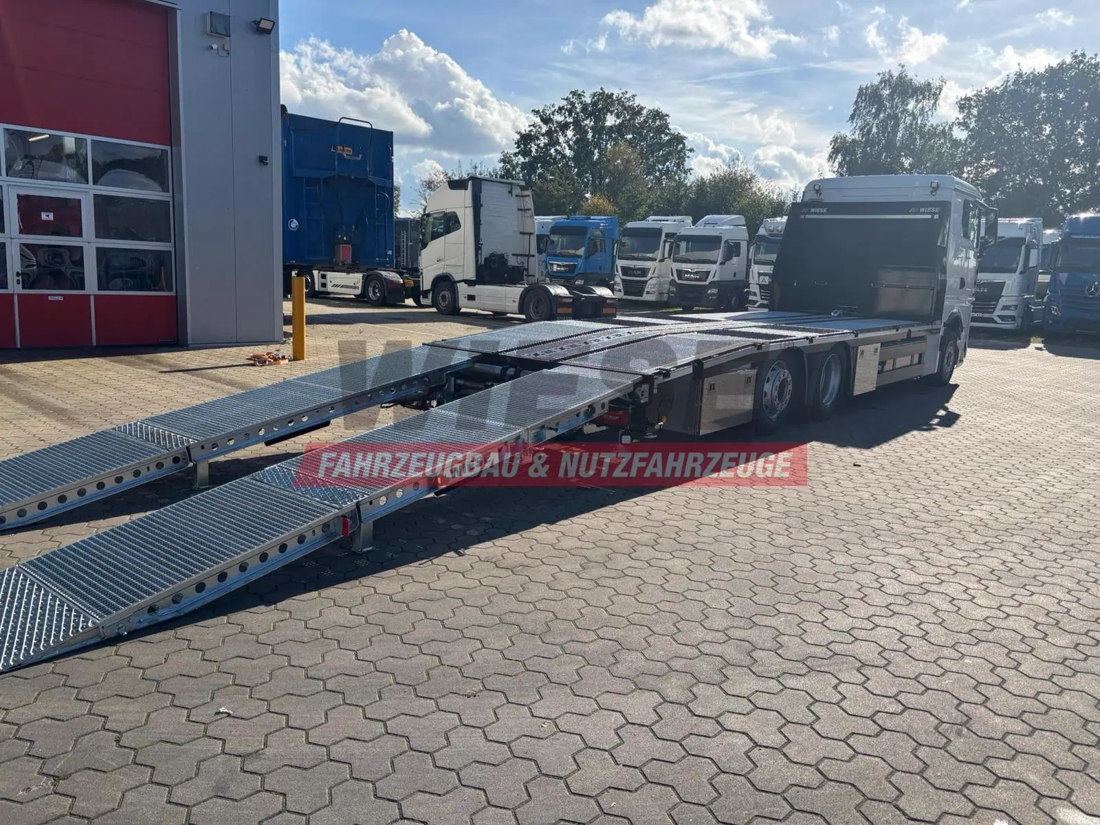 MAN Baumaschinen-  Arbeitsbühnentransporter Rampen